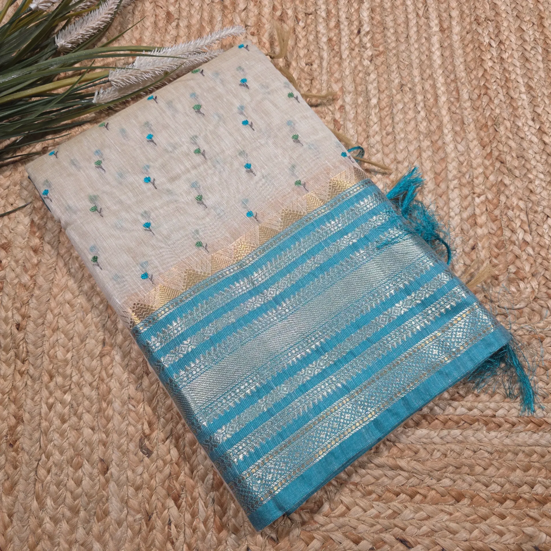 Cream Chanderi Saree with Blue Banarasi Border and Delicate Floral Embroidery